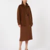 Cady-jurk met uitlopende pijpen, chocoladebruin Cady-jurk met uitlopende pijpen, chocoladebruin