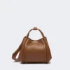 Extra kleine leren tas in marineblauw, bruin-brons Extra kleine leren tas in marineblauw, bruin-brons