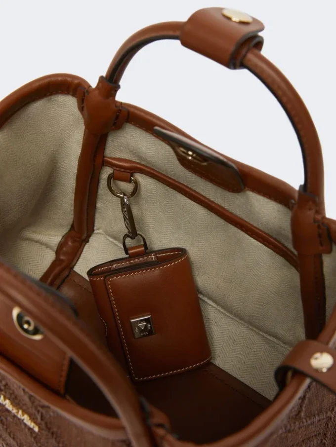 Extra kleine maritieme tas in mandvlechtwerk met ruitpatroon, amberbruin Extra kleine maritieme tas in mandvlechtwerk met ruitpatroon, amberbruin