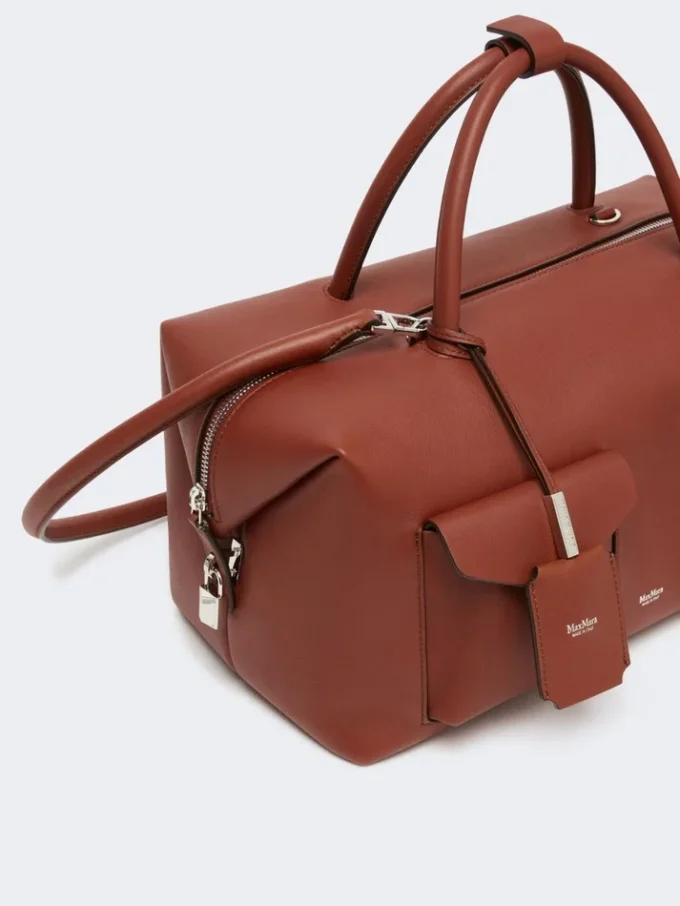 Grote leren boston-tas met zakken, roestkleur Grote leren boston-tas met zakken, roestkleur