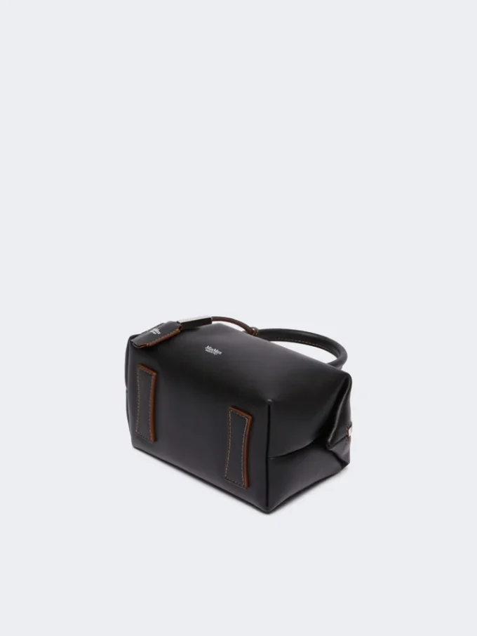 Kleine bolle tas van natuurlijk leer, zwart