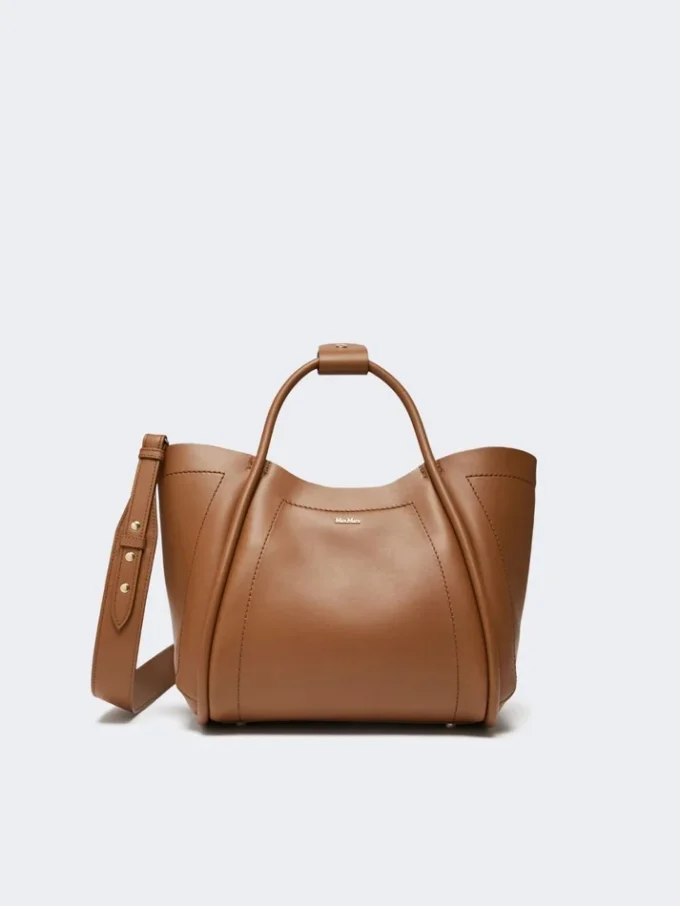 Kleine leren tas in marineblauw, bruin-brons Kleine leren tas in marineblauw, bruin-brons