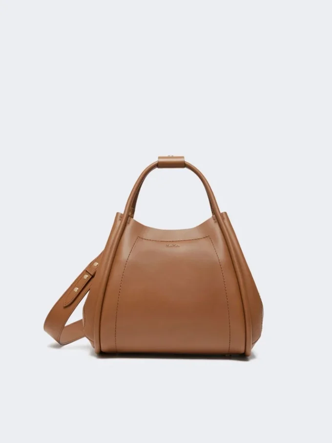 Kleine leren tas in marineblauw, bruin-brons Kleine leren tas in marineblauw, bruin-brons