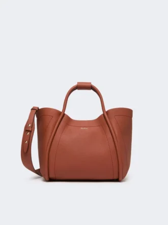 Kleine leren tas in marineblauw, roestkleur