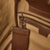 Kleine marine tas van nubuckleer, donkerbruin