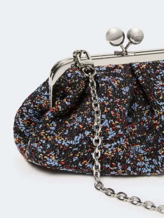 Kleine Pasticcino-tas van boucléwol, avio Kleine Pasticcino-tas van boucléwol, avio