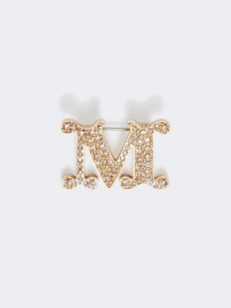 Met kristallen versierde monogrambroche, optisch wit