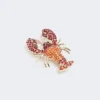 Metalen broche met strass-steentjes, donkerrood Metalen broche met strass-steentjes, donkerrood