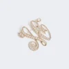 Monogrambroche met strass, ivoorkleurig Monogrambroche met strass, ivoorkleurig