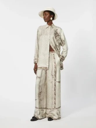 Soepelvallende zijden broek met print, ivoorkleurig Soepelvallende zijden broek met print, ivoorkleurig