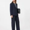Marineblauwe stretchwolblazer met dubbele knoopsluiting