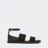 Platte sandalen van leer en elastische banden, zwart