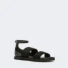 Platte sandalen van leer en elastische banden, zwart
