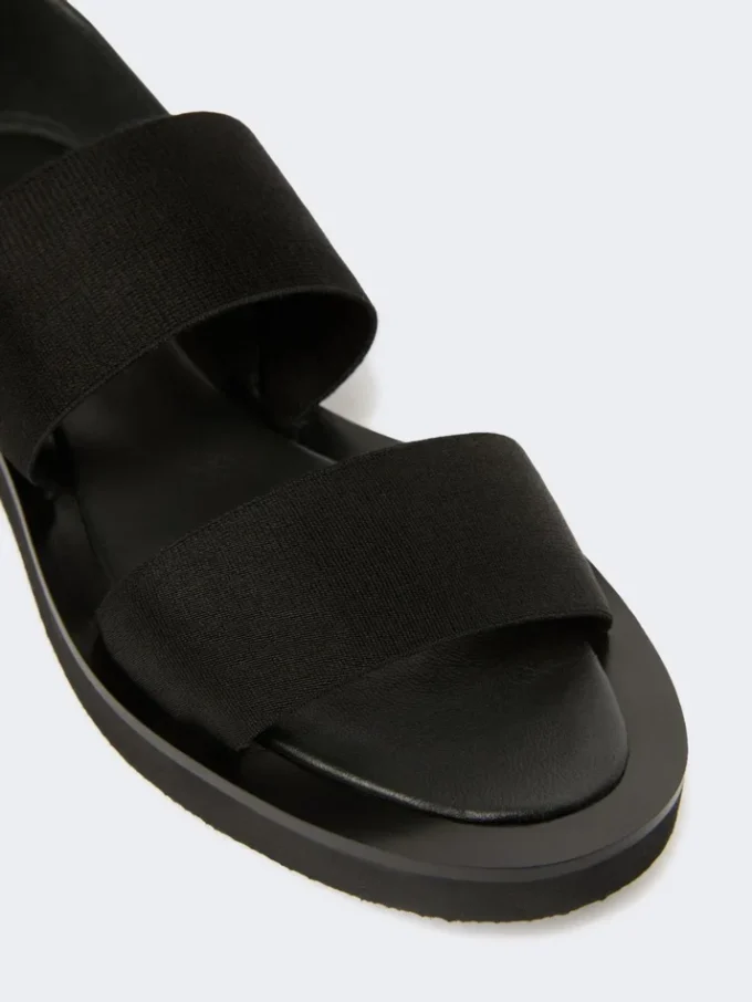 Platte sandalen van leer en elastische banden, zwart