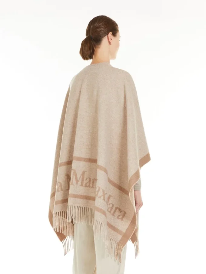 Poncho van jacquardwol, beige Poncho van jacquardwol, beige