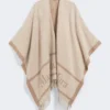 Poncho van jacquardwol, beige Poncho van jacquardwol, beige