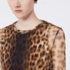 Top van twee materialen met dierenprint, beige