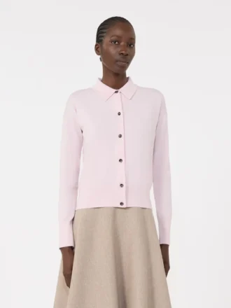 Vrouwelijk wollen vest, roze