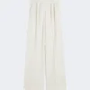 Wijdvallende broek van piquajersey met krijtstreep, wit Wijdvallende broek van piquajersey met krijtstreep, wit