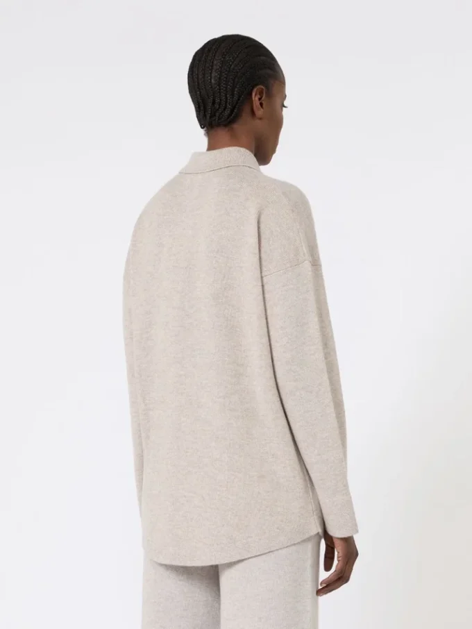 Wollen en kasjmier vest, beige Wollen en kasjmier vest, beige