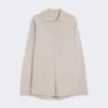 Wollen en kasjmier vest, beige Wollen en kasjmier vest, beige